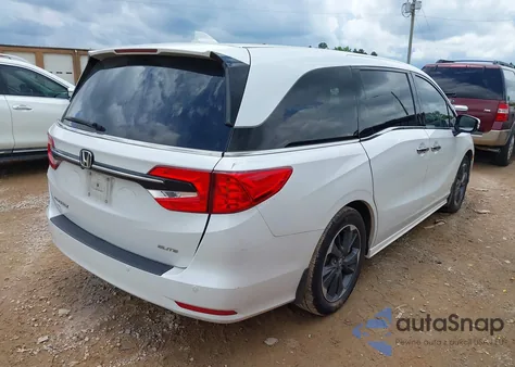 2023 Honda Odyssey Elite z USA, uszkodzony, nr VIN 5FNRL6H92PB021951